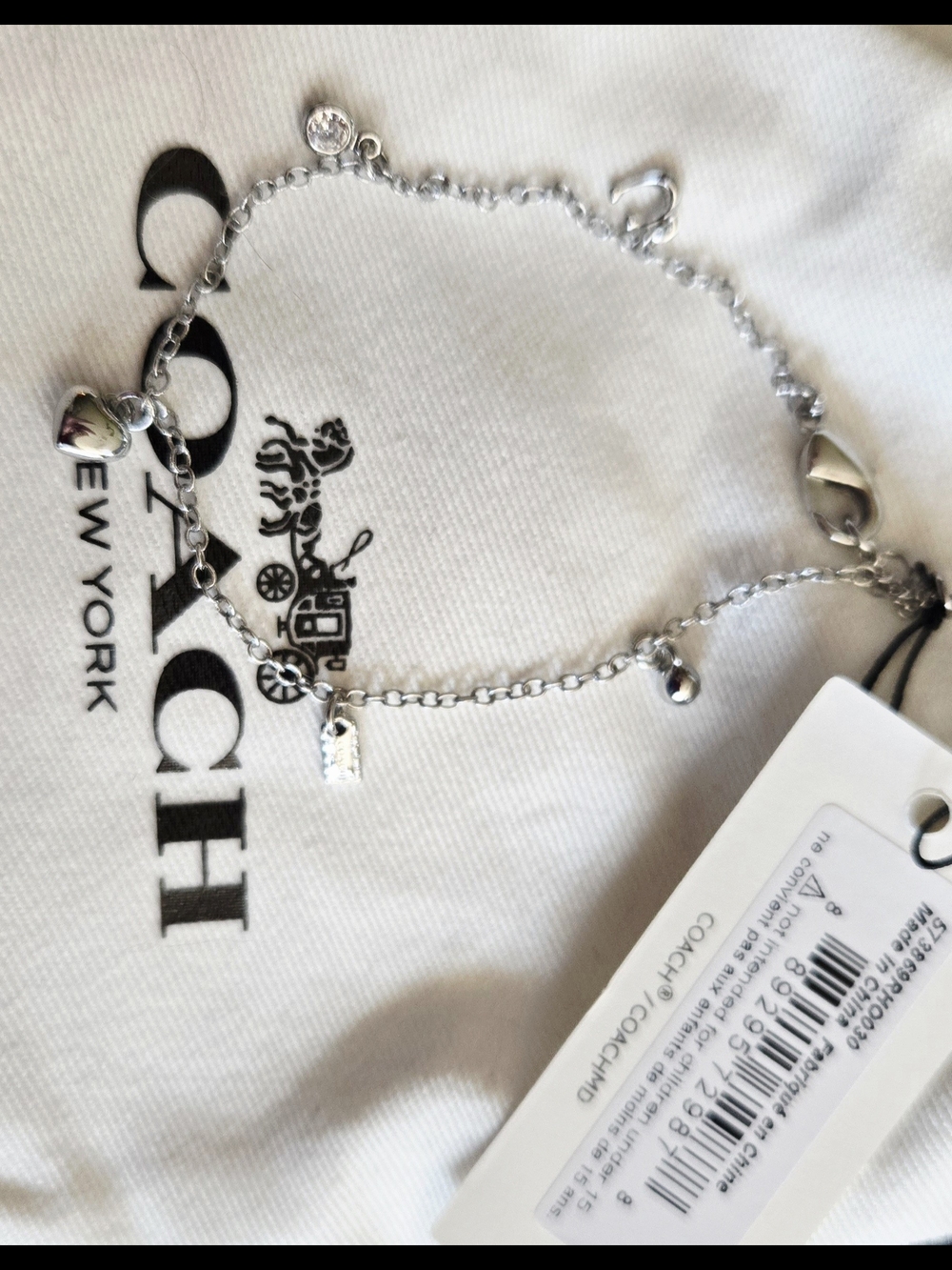 Coach Silver Charm Bracelet with Heart Accents